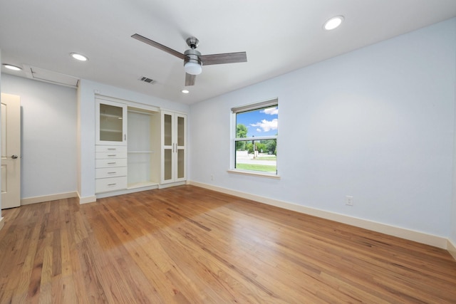 5710 Forest Ln, Dallas, TX 75230 - unfurnished bedroom with light wood finished floors, recessed lighting, and ceiling fan