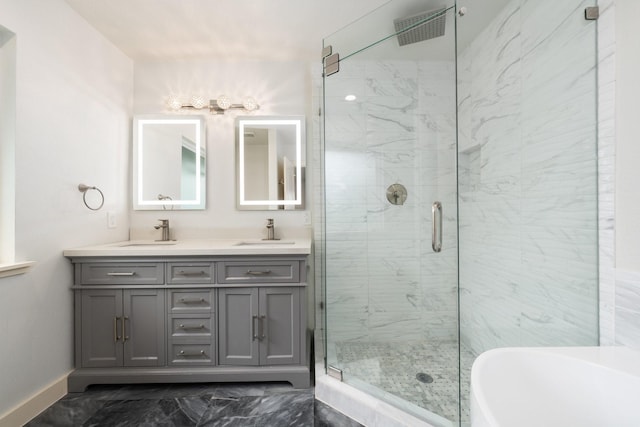 5710 Forest Ln, Dallas, TX 75230 - full bathroom featuring a marble finish shower, marble look tiles, double vanity, and a freestanding bath