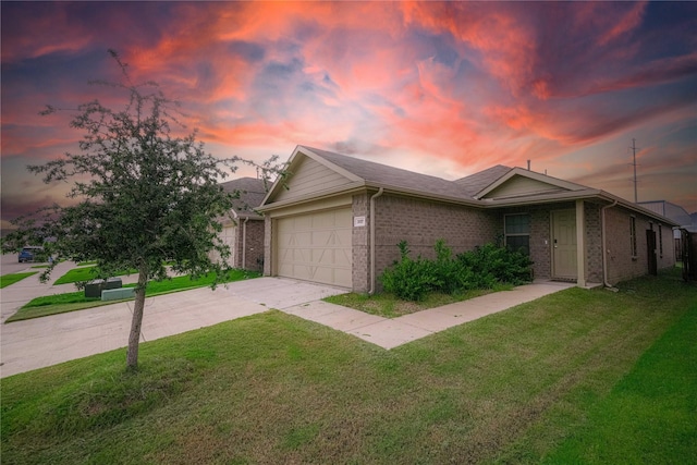 3117 Harper St, Little Elm, TX 75068 - view of home's exterior featuring an attached garage, concrete driveway, brick siding, and a yard