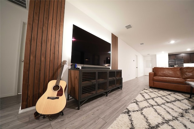 3117 Harper St, Little Elm, TX 75068 - living room with wood finished floors and recessed lighting