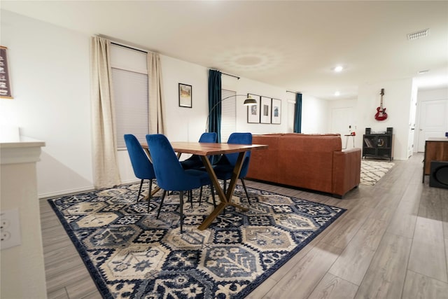 3117 Harper St, Little Elm, TX 75068 - dining space with wood finished floors and recessed lighting
