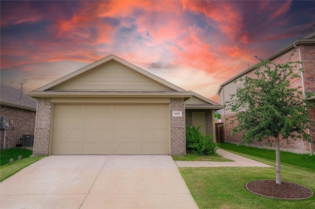 3117 Harper St, Little Elm, TX 75068 - view of front of home with a yard, driveway, brick siding, and an attached garage