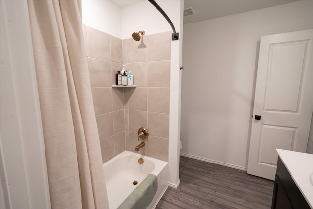 3117 Harper St, Little Elm, TX 75068 - full bath with vanity, shower / bathtub combination with curtain, and wood finished floors