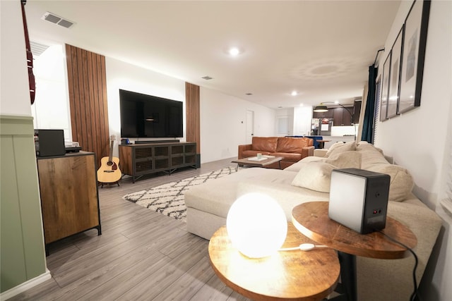 3117 Harper St, Little Elm, TX 75068 - living room featuring light wood finished floors and recessed lighting
