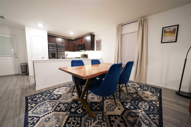 3117 Harper St, Little Elm, TX 75068 - dining room featuring wood finished floors and recessed lighting