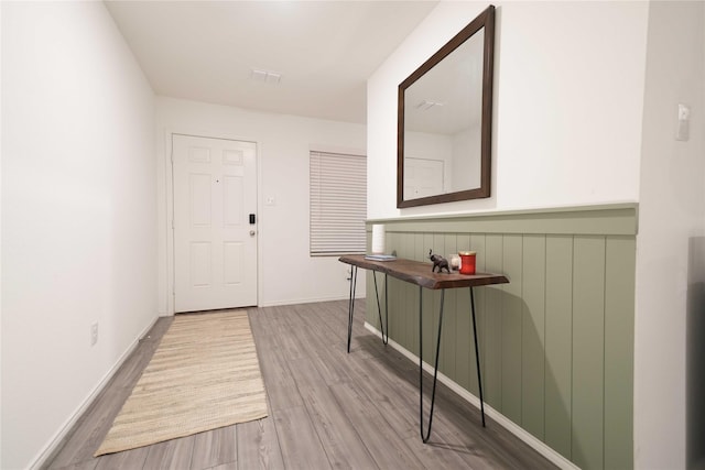 3117 Harper St, Little Elm, TX 75068 - hallway with wood finished floors and wainscoting