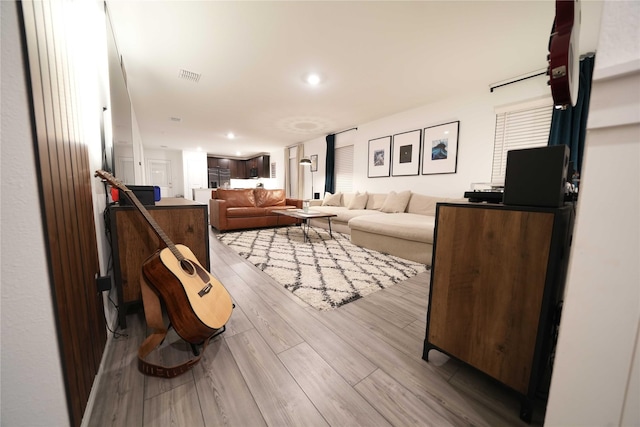 3117 Harper St, Little Elm, TX 75068 - living area with wood finished floors and recessed lighting