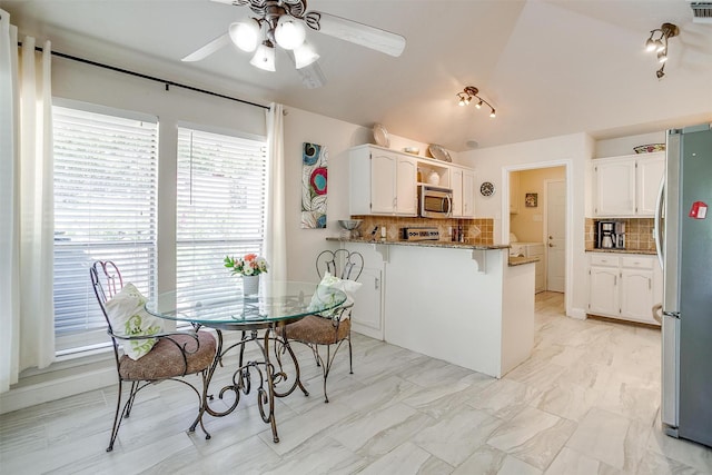 107 Sundance Ct, Hudson Oaks, TX 76087 - dining space featuring a ceiling fan and lofted ceiling