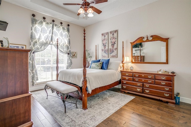 107 Sundance Ct, Hudson Oaks, TX 76087 - bedroom featuring dark wood-style flooring and a ceiling fan