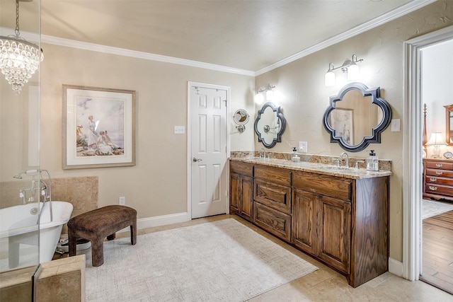 107 Sundance Ct, Hudson Oaks, TX 76087 - bathroom with double vanity, a freestanding bath, ornamental molding, tile patterned floors, and a chandelier