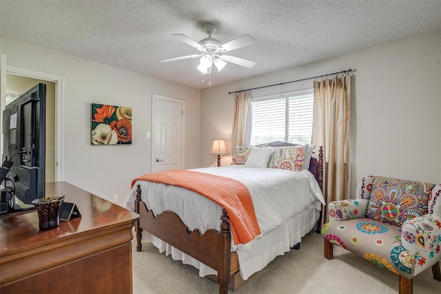 107 Sundance Ct, Hudson Oaks, TX 76087 - bedroom featuring light carpet, a ceiling fan, and a textured ceiling