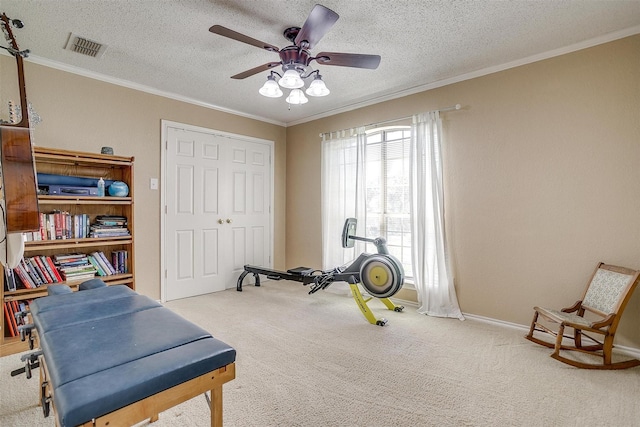 107 Sundance Ct, Hudson Oaks, TX 76087 - workout area featuring carpet flooring, ornamental molding, ceiling fan, and a textured ceiling