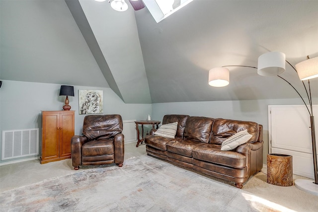 107 Sundance Ct, Hudson Oaks, TX 76087 - living area featuring light colored carpet, lofted ceiling, and a skylight