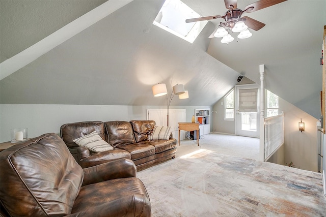 107 Sundance Ct, Hudson Oaks, TX 76087 - living area with vaulted ceiling, carpet flooring, a ceiling fan, and a skylight