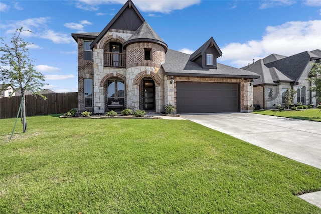 303 Hidden Cove Dr, Ponder, TX 76259 - french country style house featuring stone siding, a garage, driveway, brick siding, and roof with shingles
