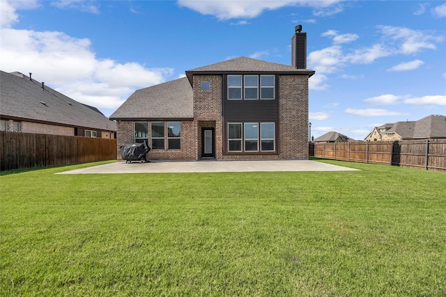 303 Hidden Cove Dr, Ponder, TX 76259 - rear view of property featuring brick siding, a patio area, a chimney, and a fenced backyard