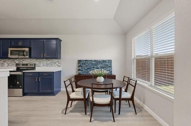 1909 Morning Dove, Aubrey, TX 76227 - dining room with light wood finished floors and lofted ceiling