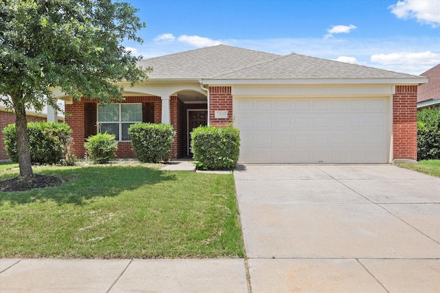 1909 Morning Dove, Aubrey, TX 76227 - ranch-style home with brick siding, a front yard, concrete driveway, an attached garage, and roof with shingles