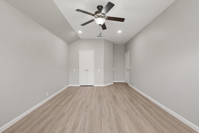 1909 Morning Dove, Aubrey, TX 76227 - unfurnished bedroom featuring light wood-style flooring, vaulted ceiling, a closet, a ceiling fan, and recessed lighting