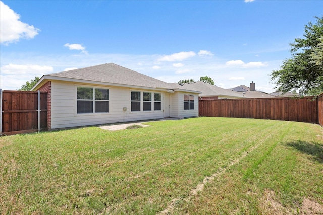 1909 Morning Dove, Aubrey, TX 76227 - rear view of property with a fenced backyard and a shingled roof