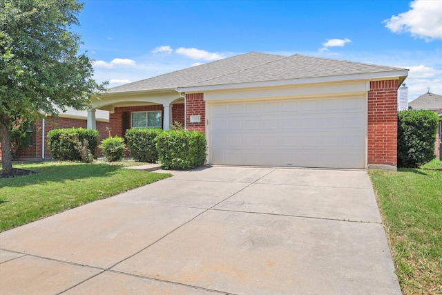 1909 Morning Dove, Aubrey, TX 76227 - single story home featuring brick siding, a front yard, concrete driveway, a garage, and a shingled roof