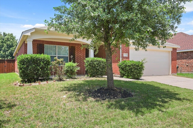 1909 Morning Dove, Aubrey, TX 76227 - view of property hidden behind natural elements featuring brick siding, concrete driveway, and a garage