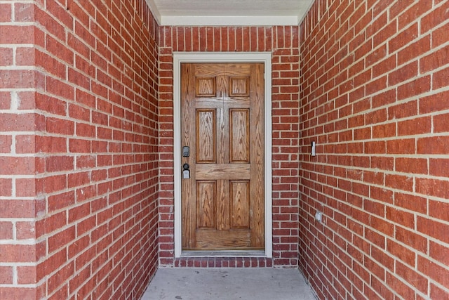 1909 Morning Dove, Aubrey, TX 76227 - view of exterior entry with brick siding