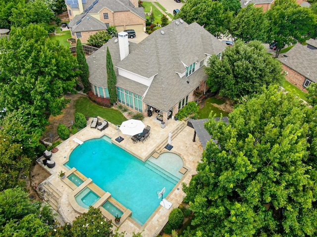 1501 Reata Dr, Carrollton, TX 75010 - view from above of property featuring a pool