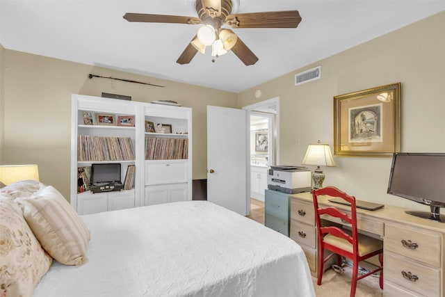 10763 Villager Unit A, Dallas, TX 75230 - bedroom with an office area and ceiling fan