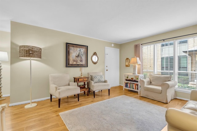 10763 Villager Unit A, Dallas, TX 75230 - living area featuring light wood-type flooring