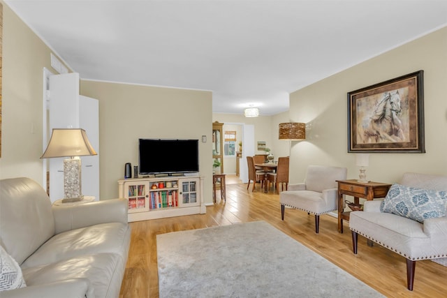 10763 Villager Unit A, Dallas, TX 75230 - living room featuring light wood-style floors