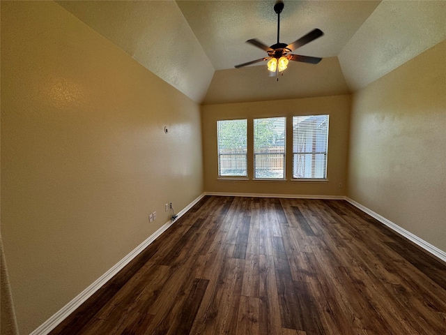 205 Boardwalk Ave, Waxahachie, TX 75165 - unfurnished room featuring dark wood-type flooring, ceiling fan, vaulted ceiling, and a textured wall