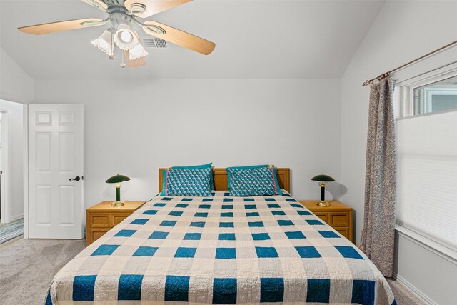 9013 Topperwind Ct, Fort Worth, TX 76134 - bedroom with lofted ceiling, carpet floors, and a ceiling fan