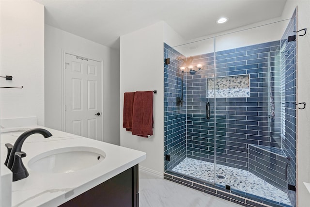 9013 Topperwind Ct, Fort Worth, TX 76134 - bathroom featuring double vanity, a shower stall, recessed lighting, and marble finish flooring