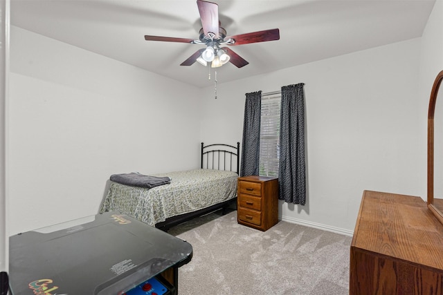9013 Topperwind Ct, Fort Worth, TX 76134 - bedroom with carpet flooring and a ceiling fan