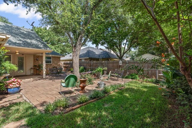 9013 Topperwind Ct, Fort Worth, TX 76134 - view of yard with a patio