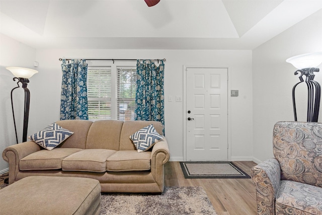 9013 Topperwind Ct, Fort Worth, TX 76134 - living area featuring vaulted ceiling, wood finished floors, and a ceiling fan