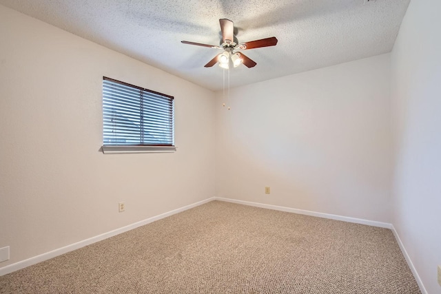 902 Via Valencia, Mesquite, TX 75150 - unfurnished room featuring carpet flooring, a ceiling fan, and a textured ceiling