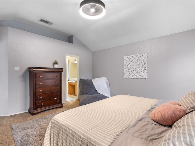 741 High Point Dr, Midlothian, TX 76065 - bedroom with vaulted ceiling, light colored carpet, and ensuite bathroom