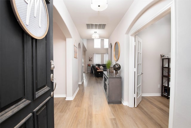 12720 Outlook Ave, Fort Worth, TX 76244 - entryway featuring light wood finished floors and arched walkways