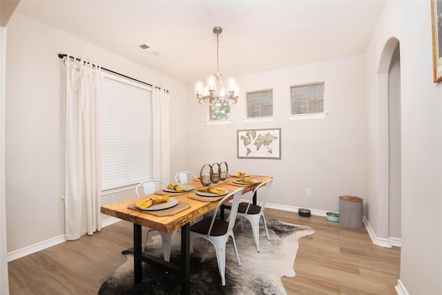 12720 Outlook Ave, Fort Worth, TX 76244 - dining area featuring a chandelier and light wood finished floors