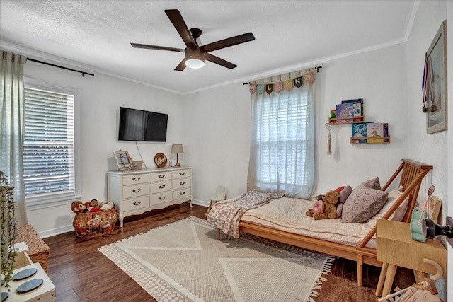 315 N Mckown Ave, Sherman, TX 75092 - bedroom with ornamental molding, wood finished floors, and ceiling fan