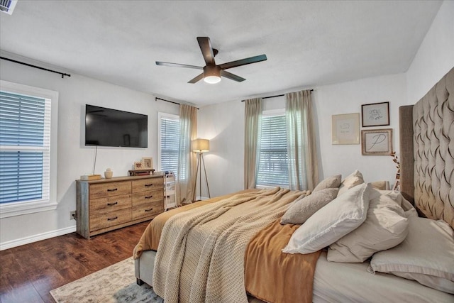 315 N Mckown Ave, Sherman, TX 75092 - bedroom with dark wood finished floors and a ceiling fan