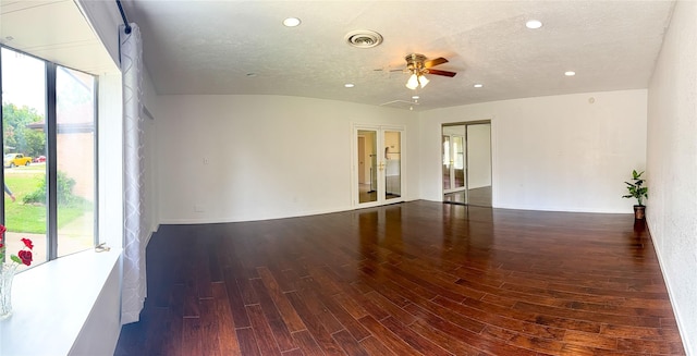 509 Cambridge, Richardson, TX 75080 - unfurnished room with wood finished floors, healthy amount of natural light, a ceiling fan, recessed lighting, and a textured ceiling