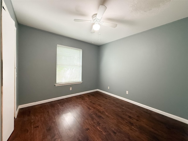 509 Cambridge, Richardson, TX 75080 - empty room featuring dark wood finished floors and a ceiling fan