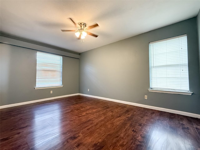 509 Cambridge, Richardson, TX 75080 - unfurnished room with a ceiling fan and dark wood finished floors