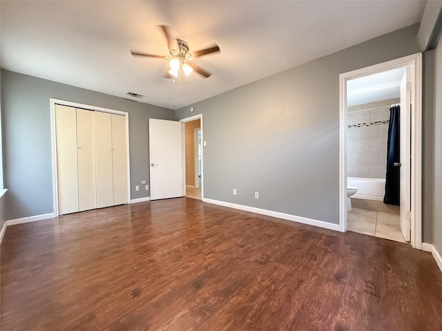 509 Cambridge, Richardson, TX 75080 - unfurnished bedroom featuring wood finished floors, a closet, ensuite bathroom, and ceiling fan