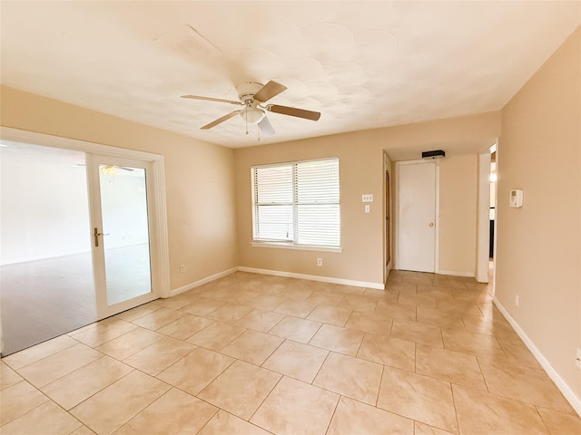 509 Cambridge, Richardson, TX 75080 - unfurnished room featuring light tile patterned flooring and a ceiling fan