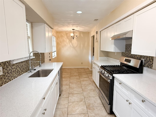 509 Cambridge, Richardson, TX 75080 - kitchen with appliances with stainless steel finishes, exhaust hood, white cabinets, a chandelier, and recessed lighting