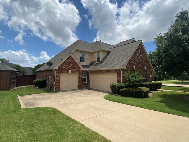 740 Bridgeport Ln, Prosper, TX 75078 - traditional-style house with brick siding, roof with shingles, concrete driveway, and an attached garage